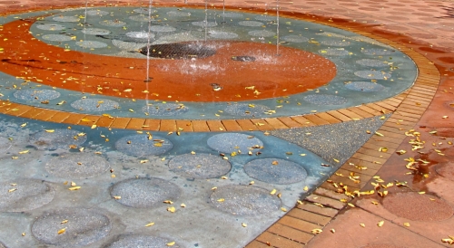 Saturday’s Wet Daily Jigsaw Puzzle – Pavement Fountain