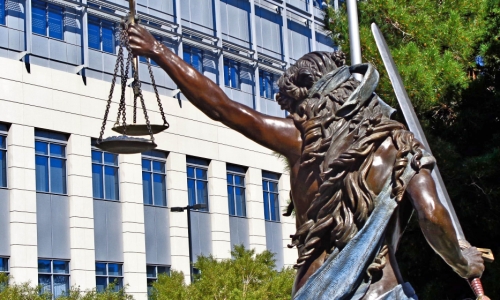 Justice – Wednesday’s Bronze Metal Daily Jigsaw Puzzle