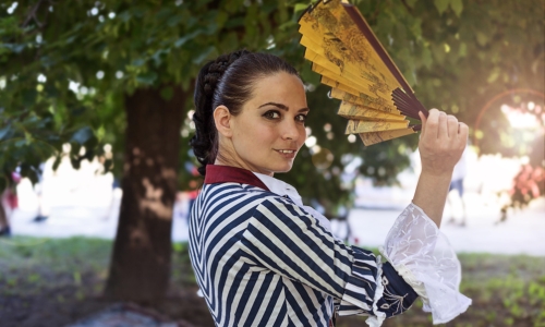 Pretty Young Lady With A Fan – Sunday’s Daily Jigsaw Puzzle