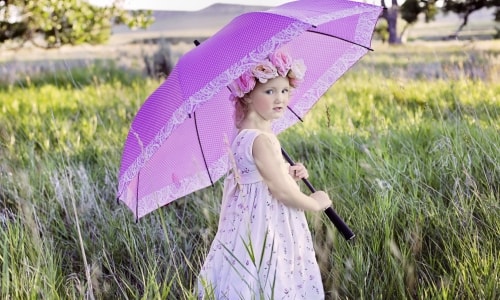 Young Girl With Umbrella – Wednesday’s Free Jigsaw Puzzle