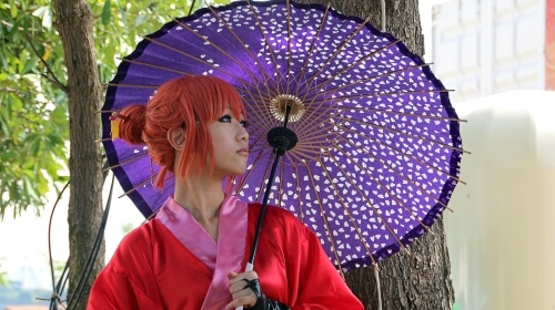 The Girl With The Purple Umbrella